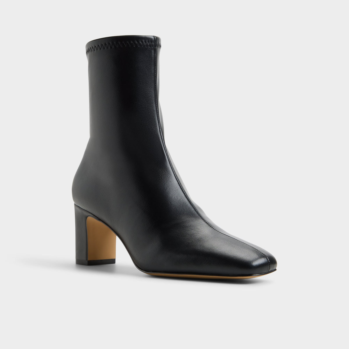Three-quarter angle of Black Kayia Block heel ankle boot's front side
