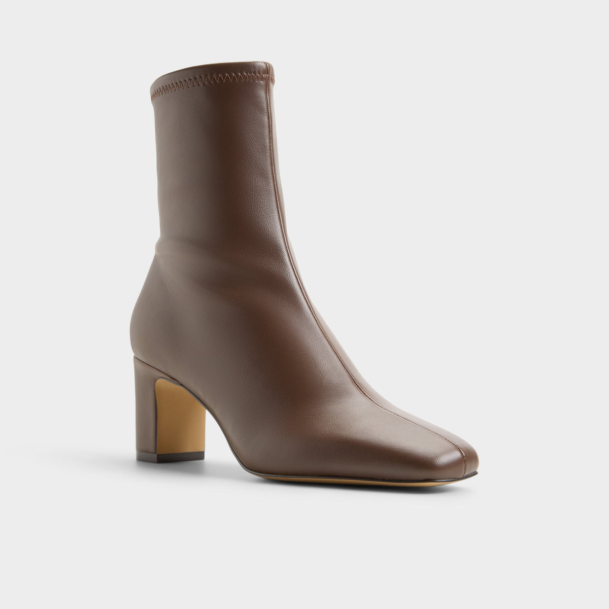Three-quarter angle of Dark brown Kayia Block heel ankle boot's front side