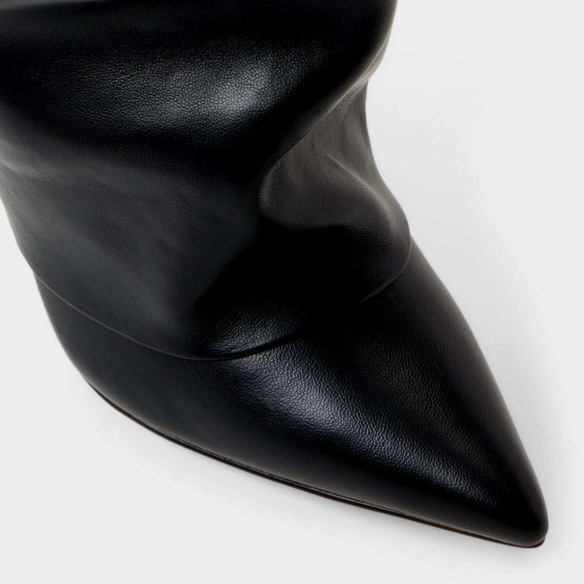 Close-up of the Other black Enalavia Stiletto heel knee-high boot