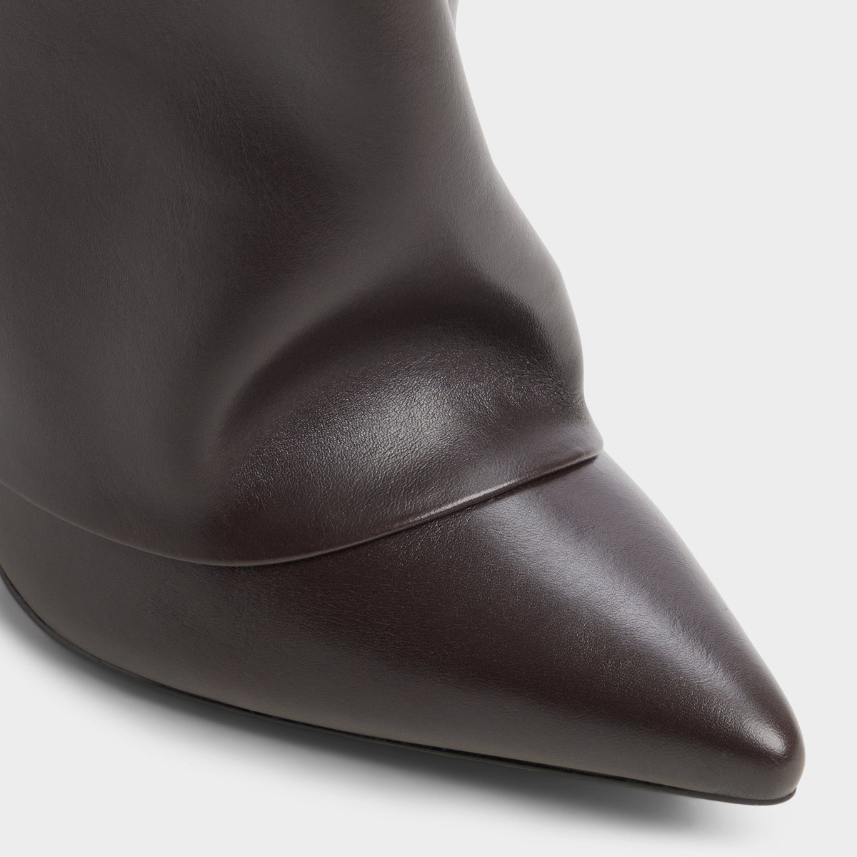 Close-up of the Dark brown Enalavia Stiletto heel knee-high boot