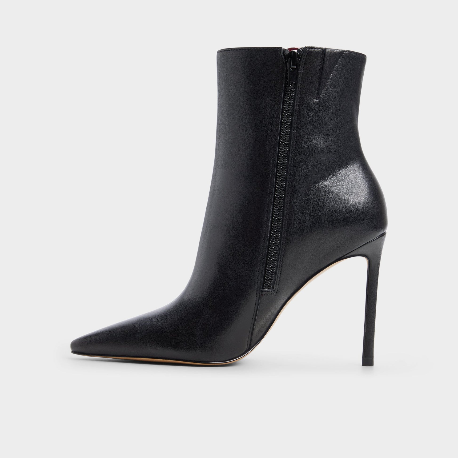 Side view of Other black Guavaberry Stiletto heel ankle boot