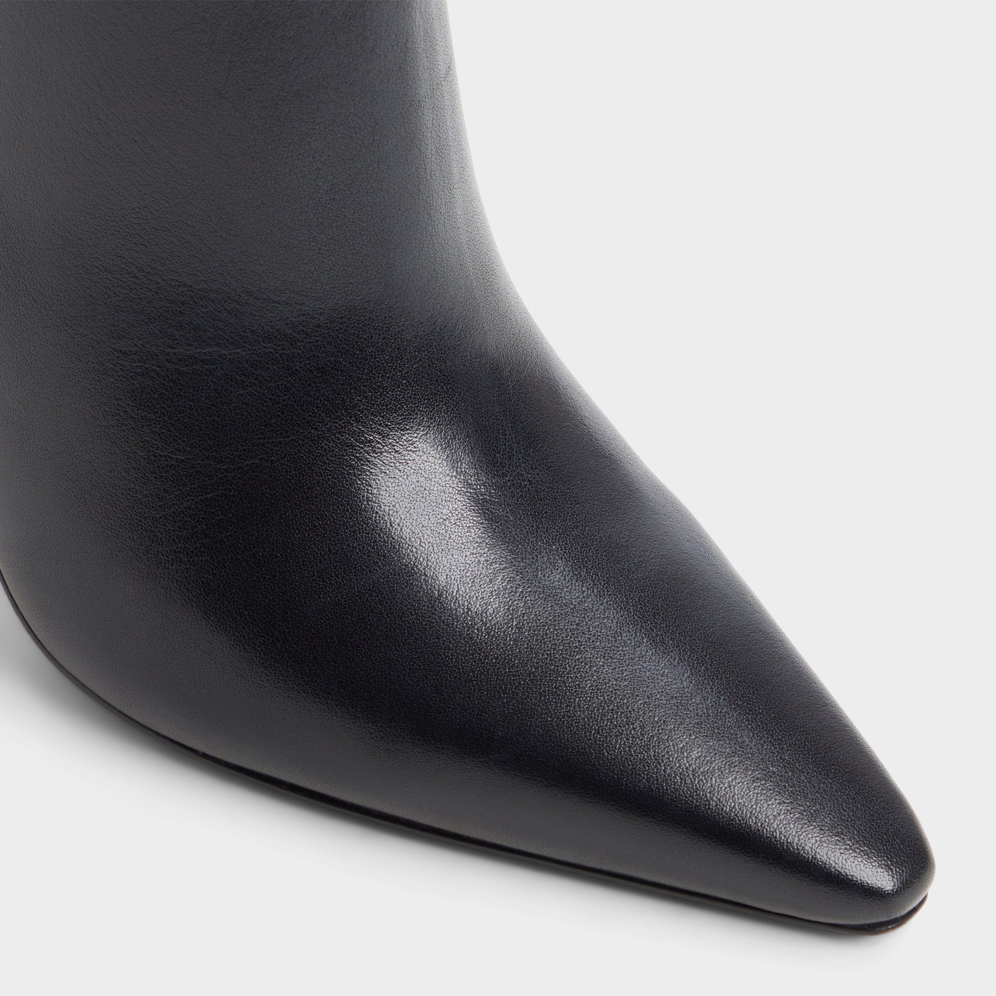 Close-up of the Other black Guavaberry Stiletto heel ankle boot