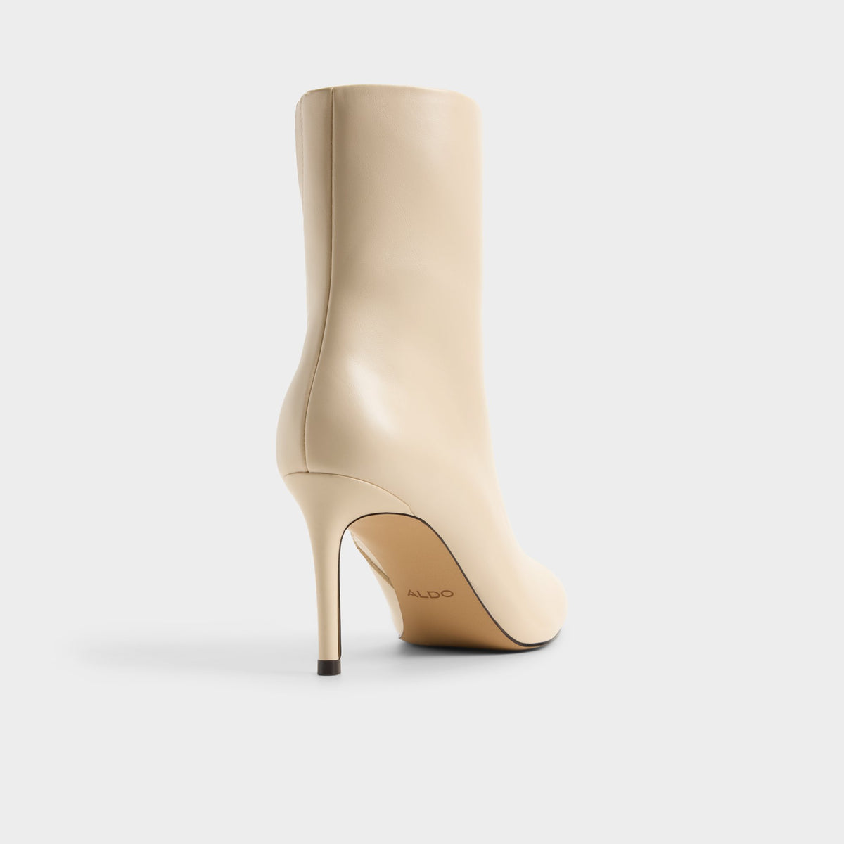 Three-quarter angle of Cream Dahlyaa Stiletto heel ankle boot's back side