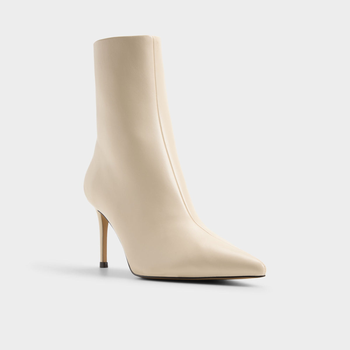 Three-quarter angle of Cream Dahlyaa Stiletto heel ankle boot's front side