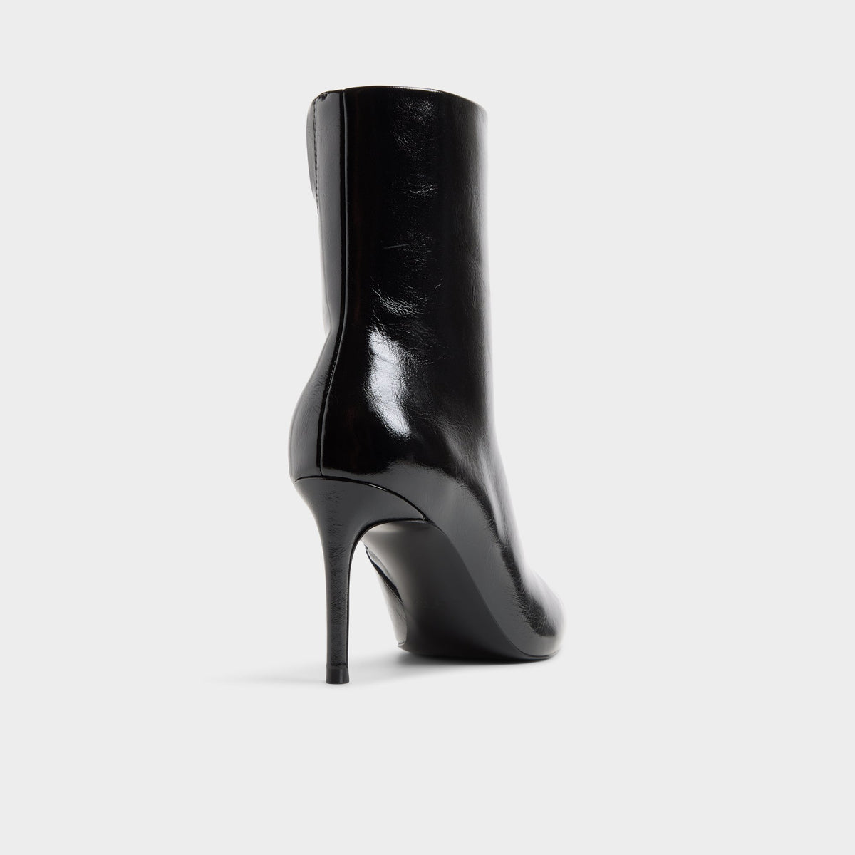 Three-quarter angle of Black Dahlyaa Stiletto heel ankle boot's back side