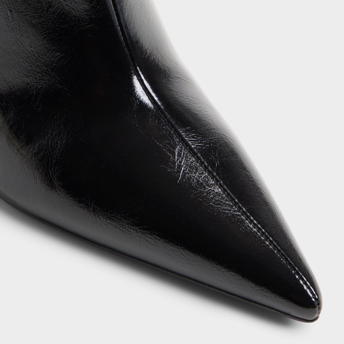 Close-up of the Black Dahlyaa Stiletto heel ankle boot