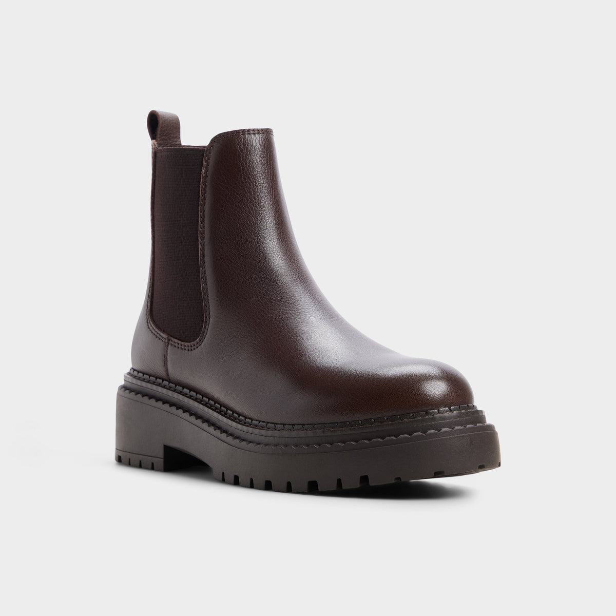 Three-quarter angle of Dark brown Bestino Lug sole Chelsea boot's front side