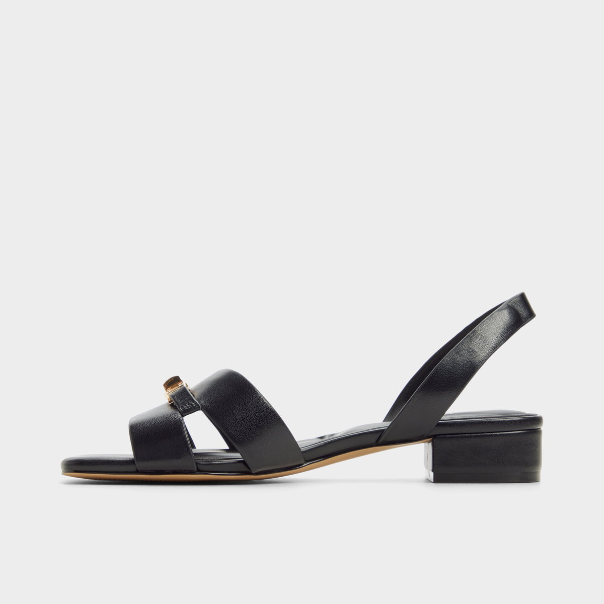 Side view of Black Javamina Sling back heeled sandal