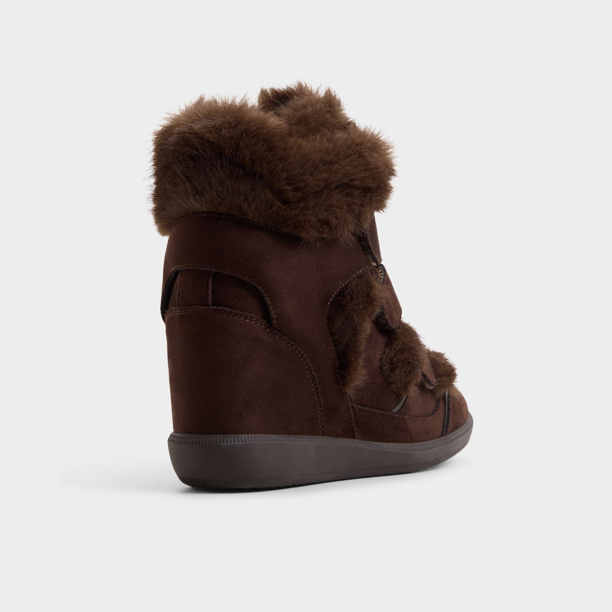 Three-quarter angle of Dark brown Belissa Wedge sneaker's back side