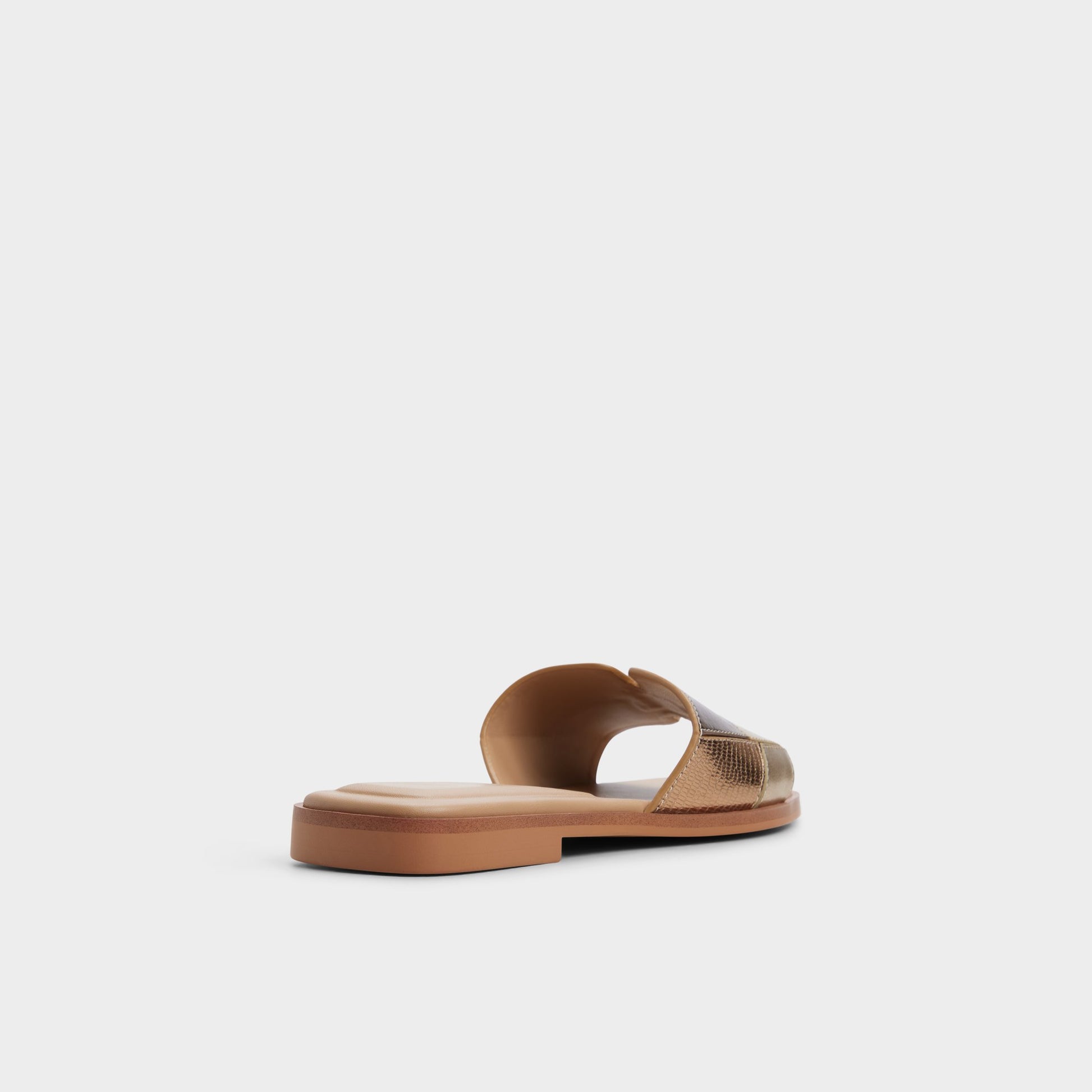 Three-quarter angle of Gold Itsandalmix Slide sandal's back side