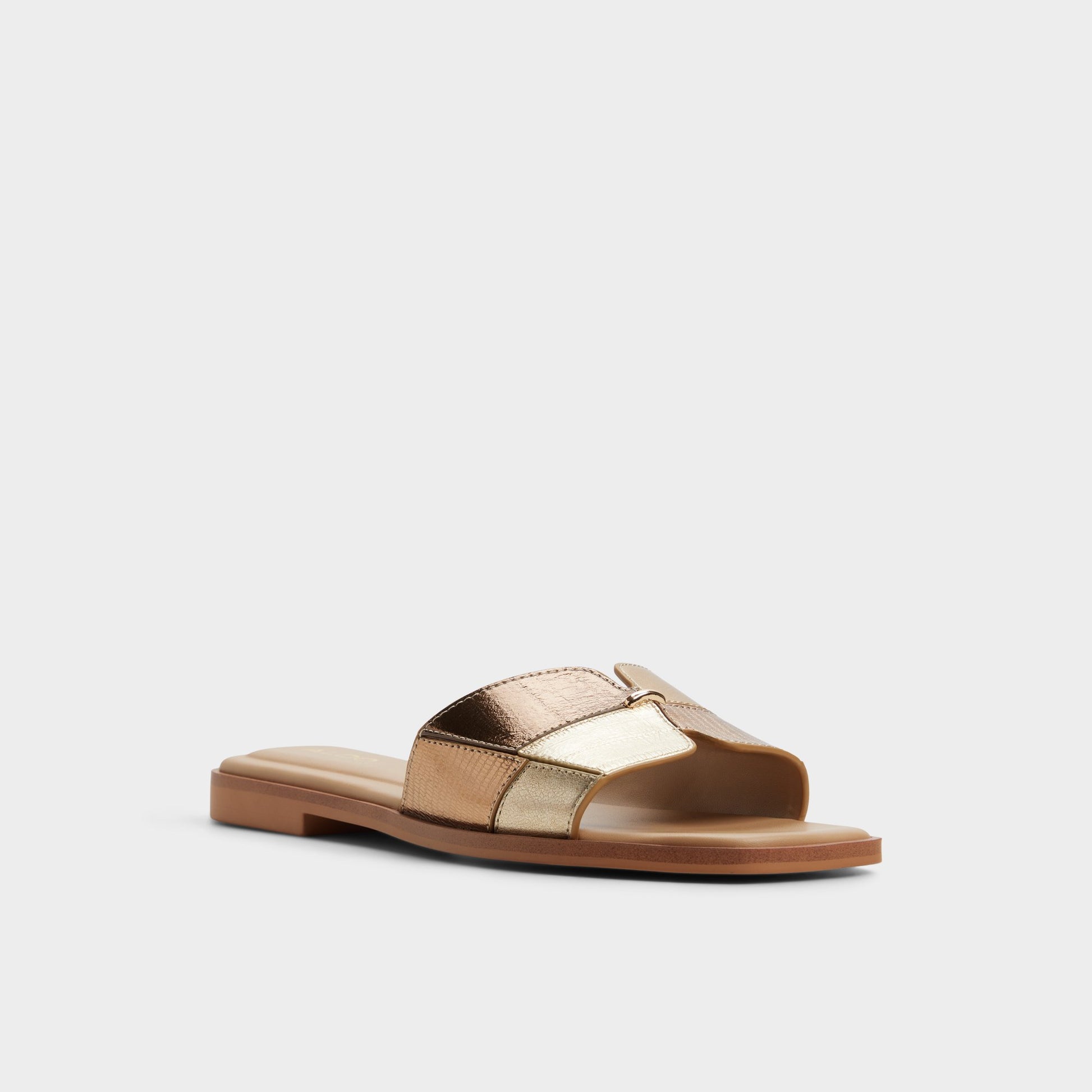Three-quarter angle of Gold Itsandalmix Slide sandal's front side