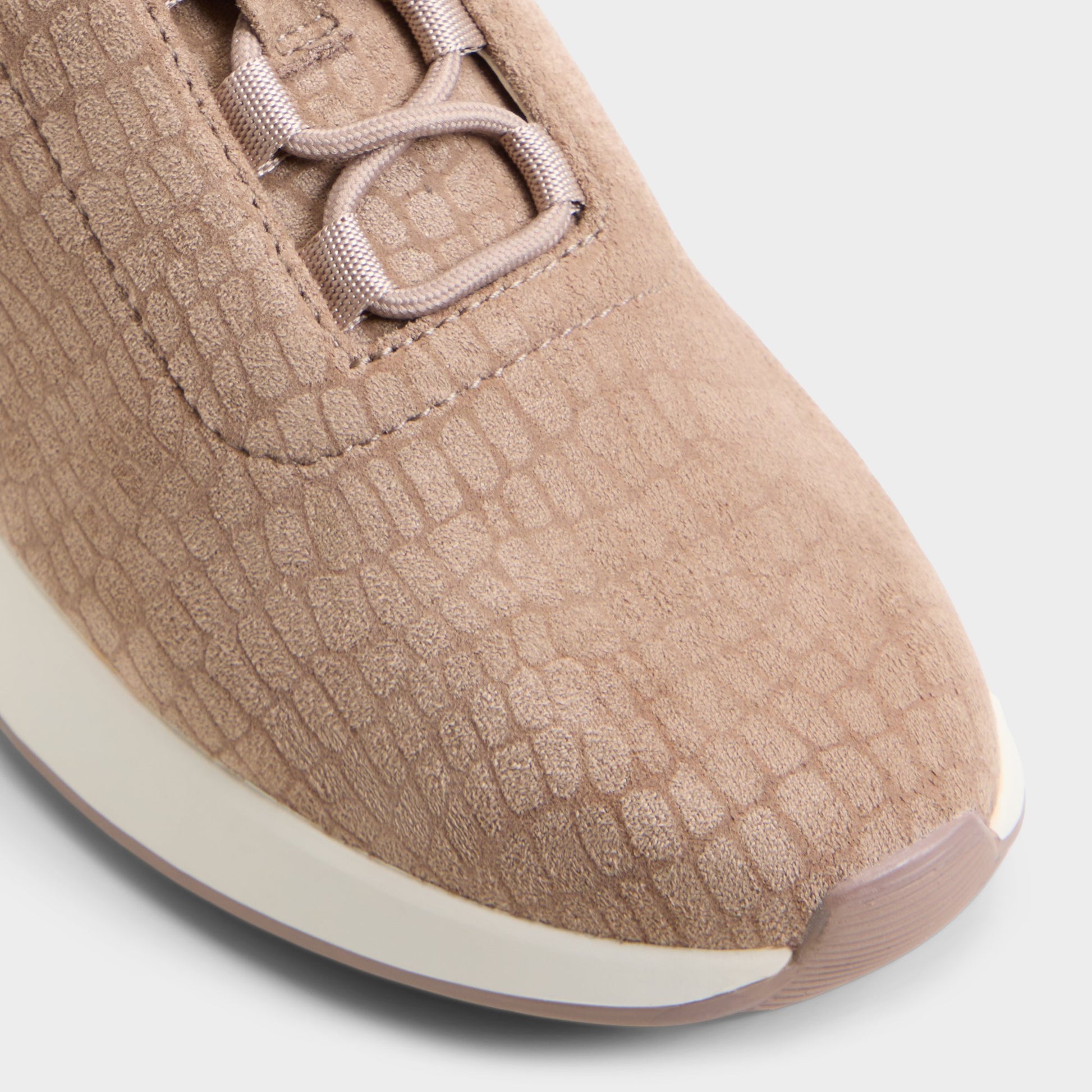 Close-up of the Taupe Brier Sneaker