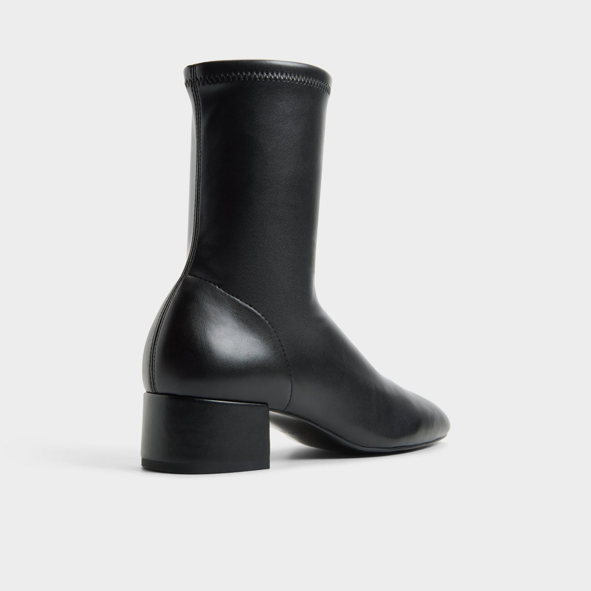 Three-quarter angle of Black Aryanea Block heel ankle boot's back side