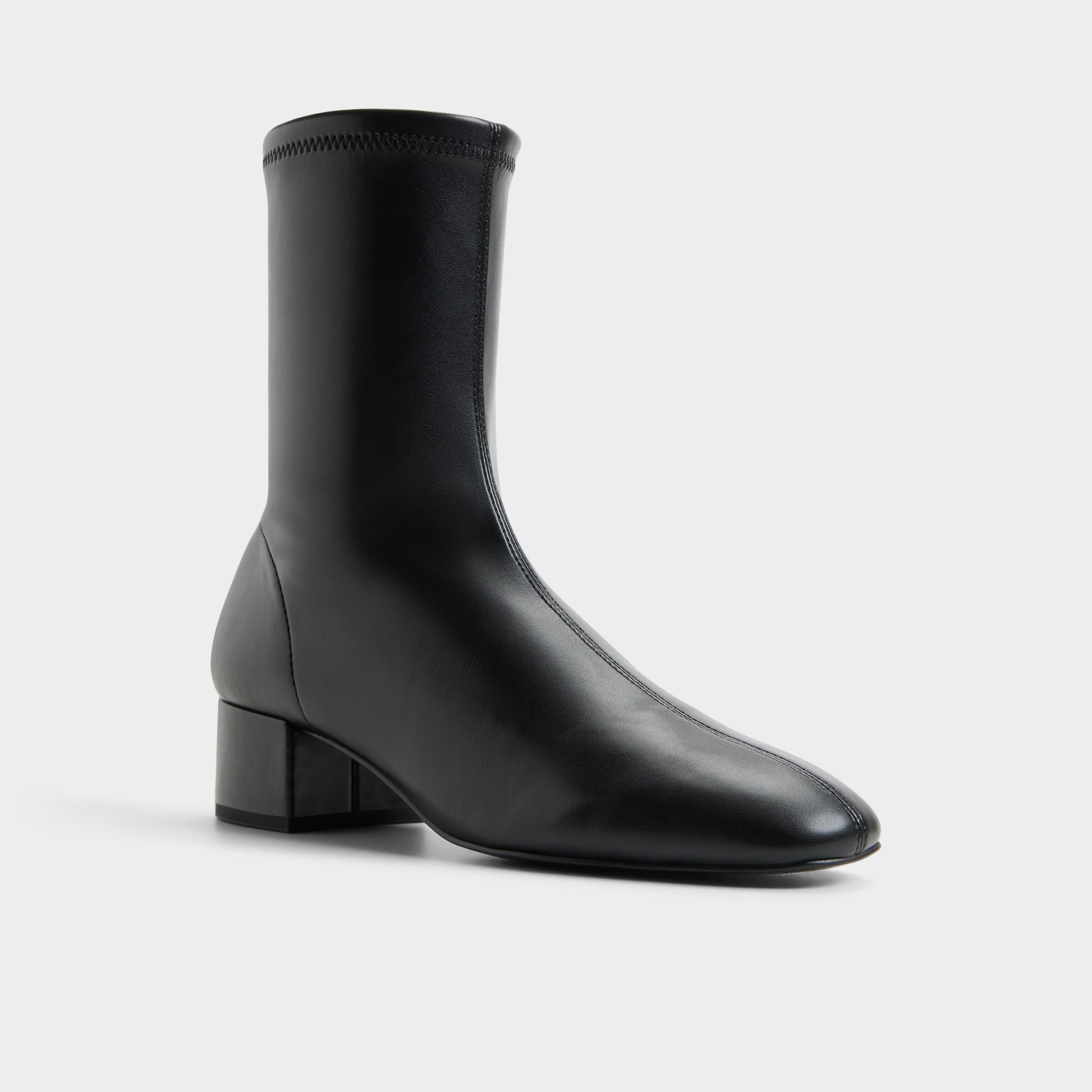 Three-quarter angle of Black Aryanea Block heel ankle boot's front side