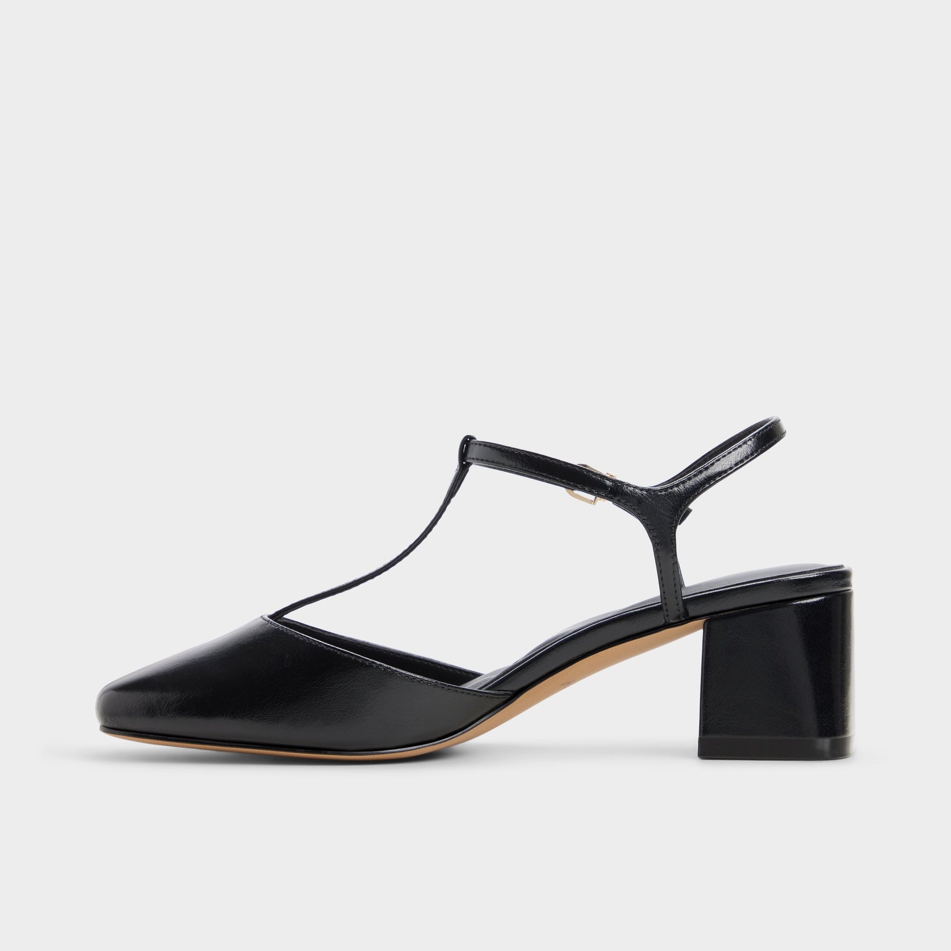 Side view of Black Bianna T-trap heeled shoe
