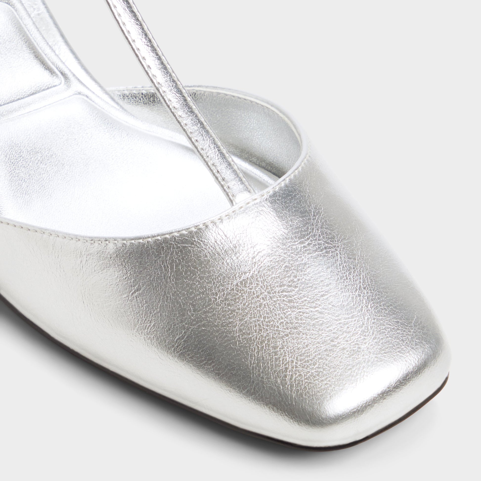 Close-up of the Silver Bianna T-trap heeled shoe