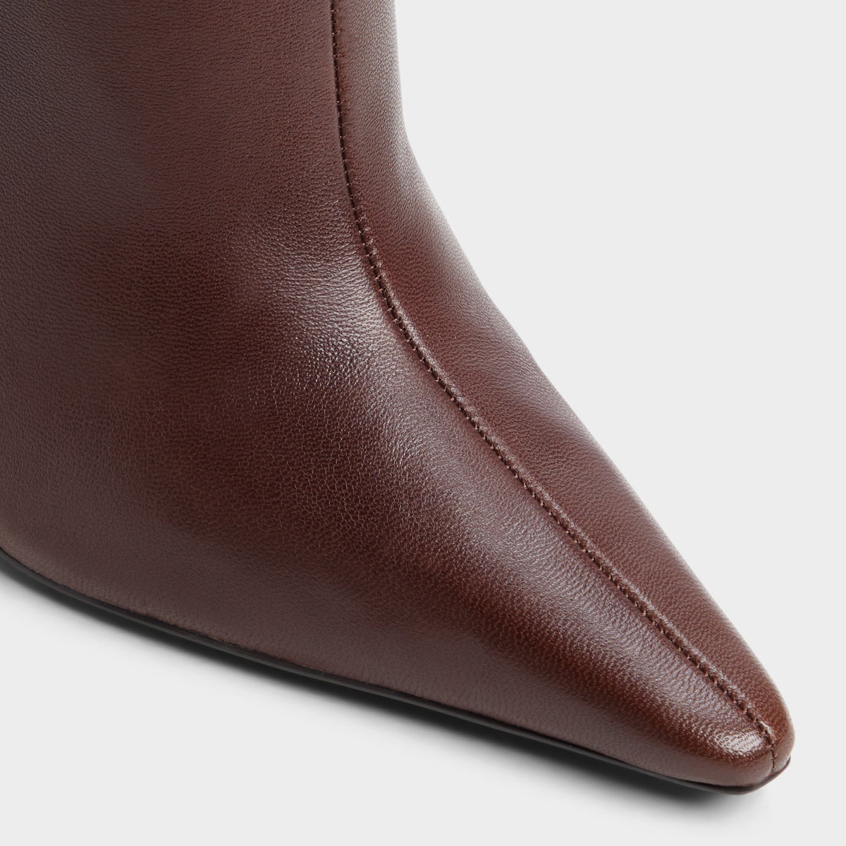 Close-up of the Dark brown Ridlee Stiletto heel knee-high boot