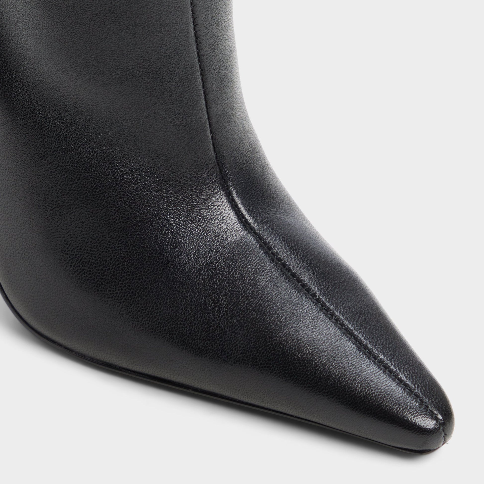 Close-up of the Black Ridlee Stiletto heel knee-high boot