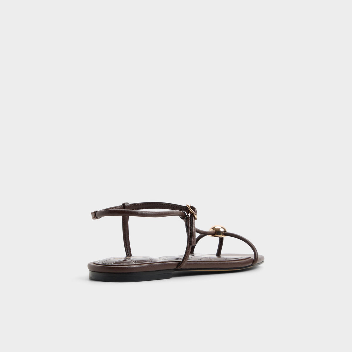 Three-quarter angle of Dark brown Zaelle Strappy flat sandal's back side