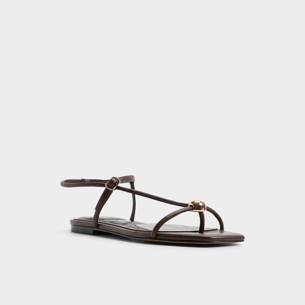Three-quarter angle of Dark brown Zaelle Strappy flat sandal's front side