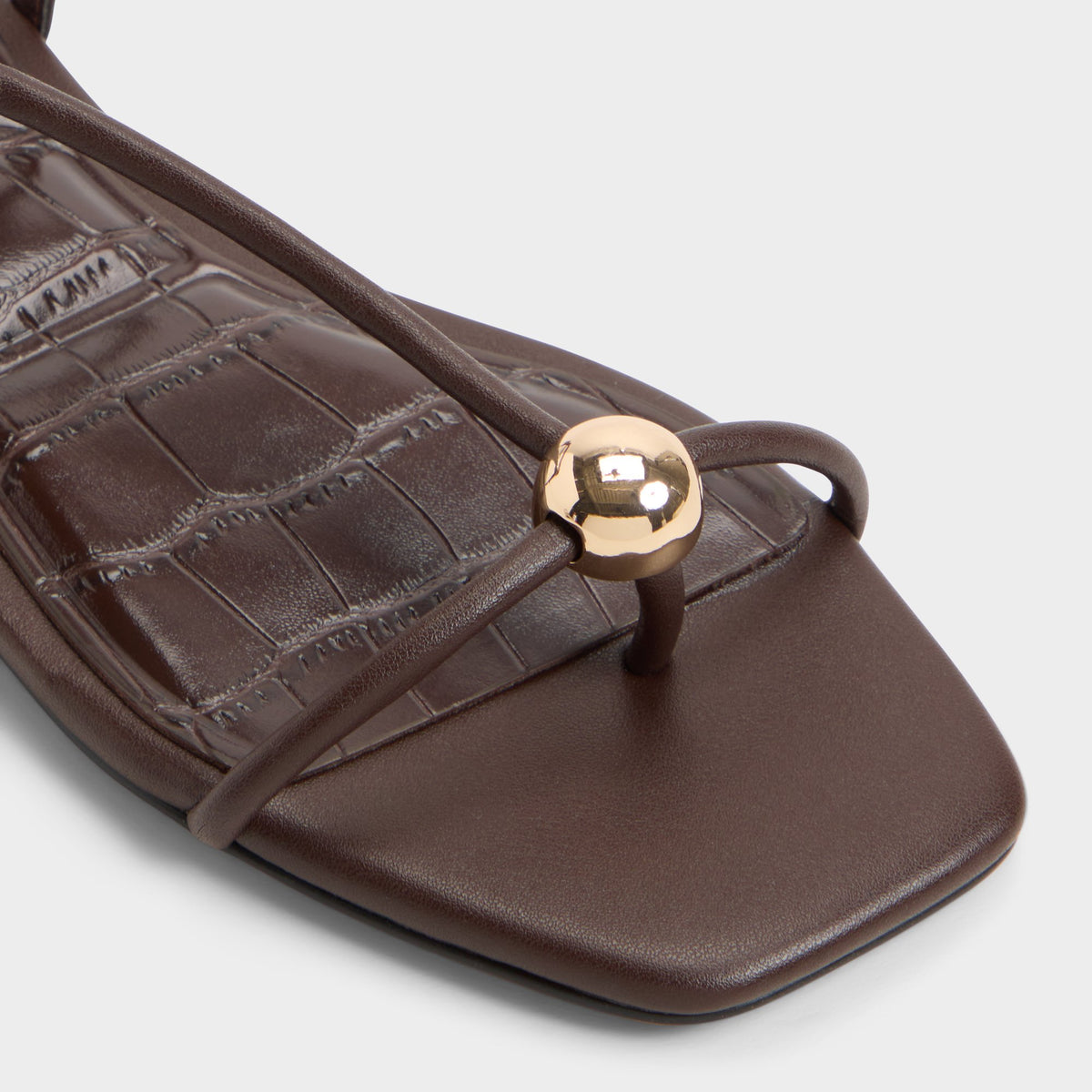 Close-up of the Dark brown Zaelle Strappy flat sandal