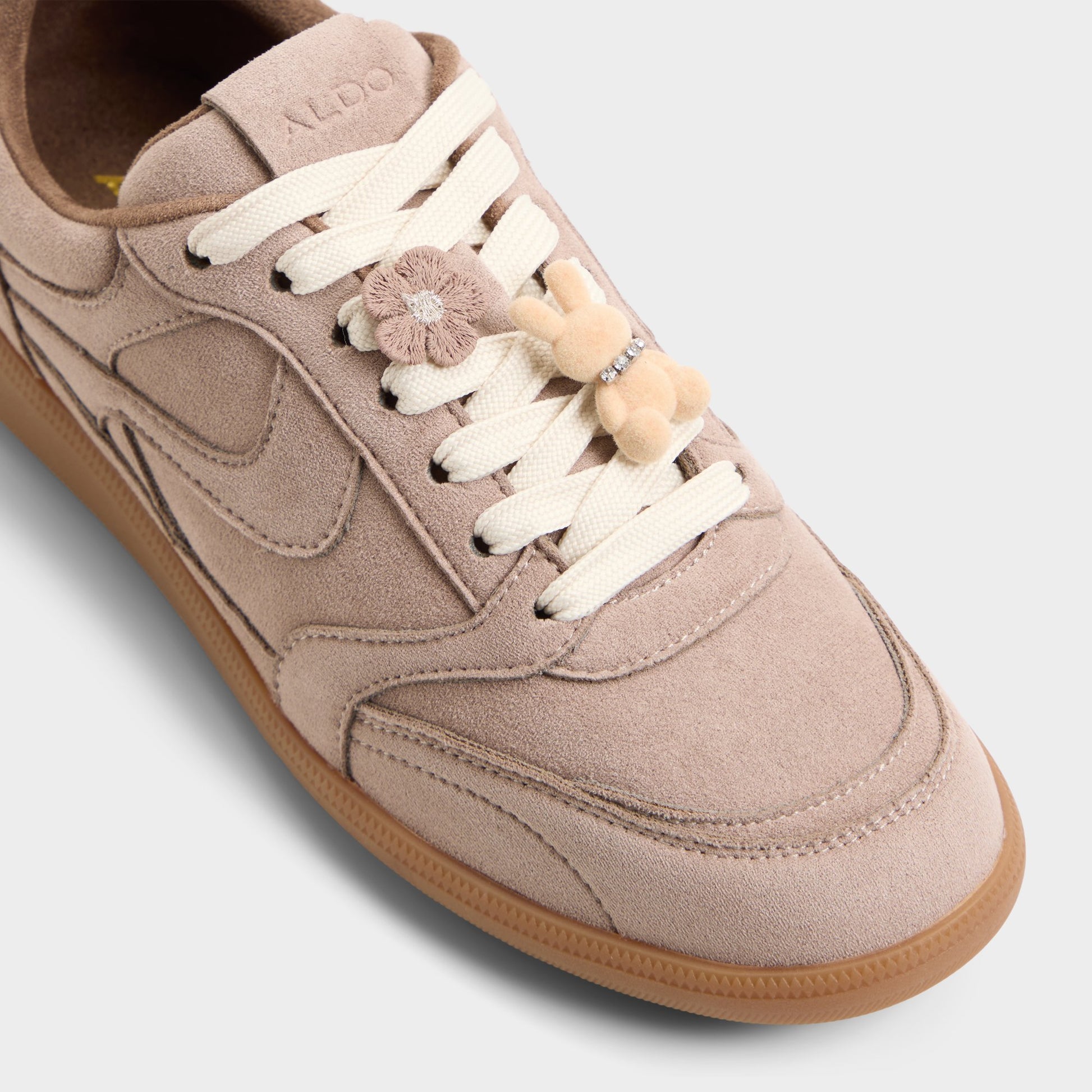Three-quarter angle of Taupe Kassis Sneaker's front side