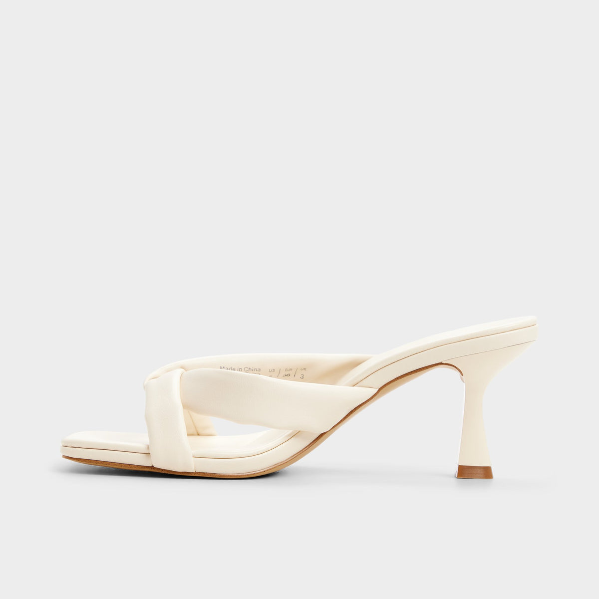 Side view of Other white Zenna Heeled flip flop