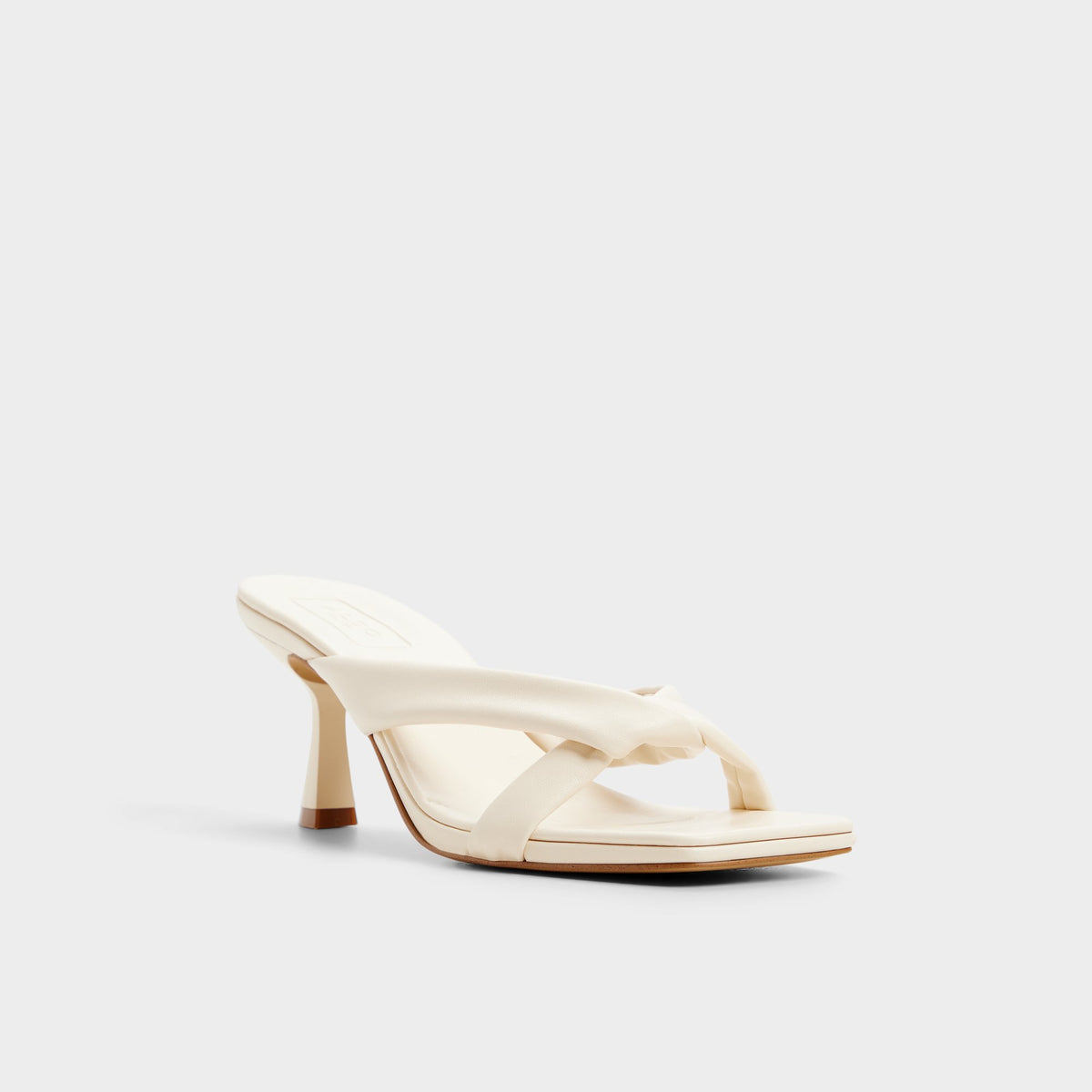 Three-quarter angle of Other white Zenna Heeled flip flop's front side