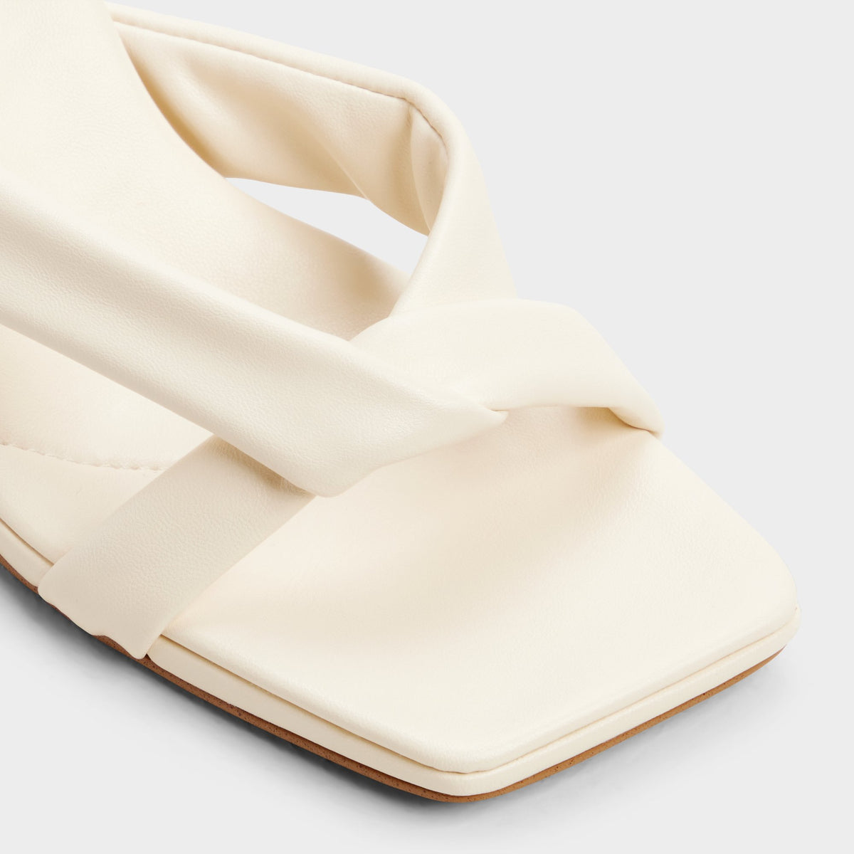 Close-up of the Other white Zenna Heeled flip flop