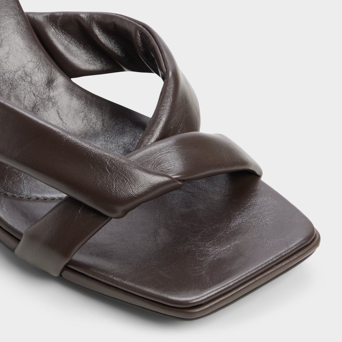 Close-up of the Dark brown Zenna Heeled flip flop