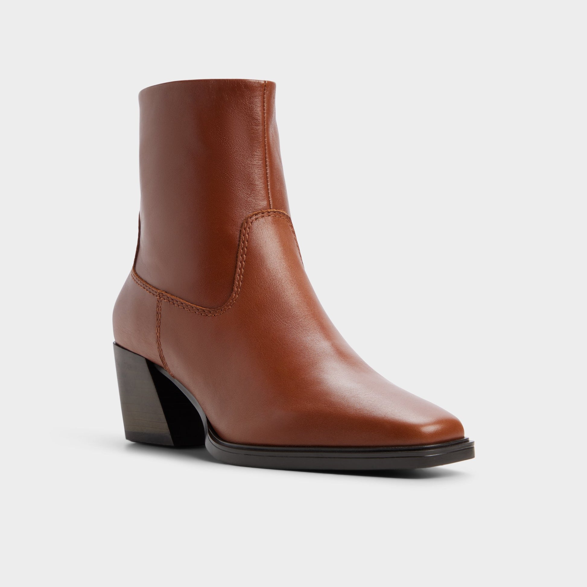 Three-quarter angle of Medium brown Ybiraweth Block heel ankle boot's front side