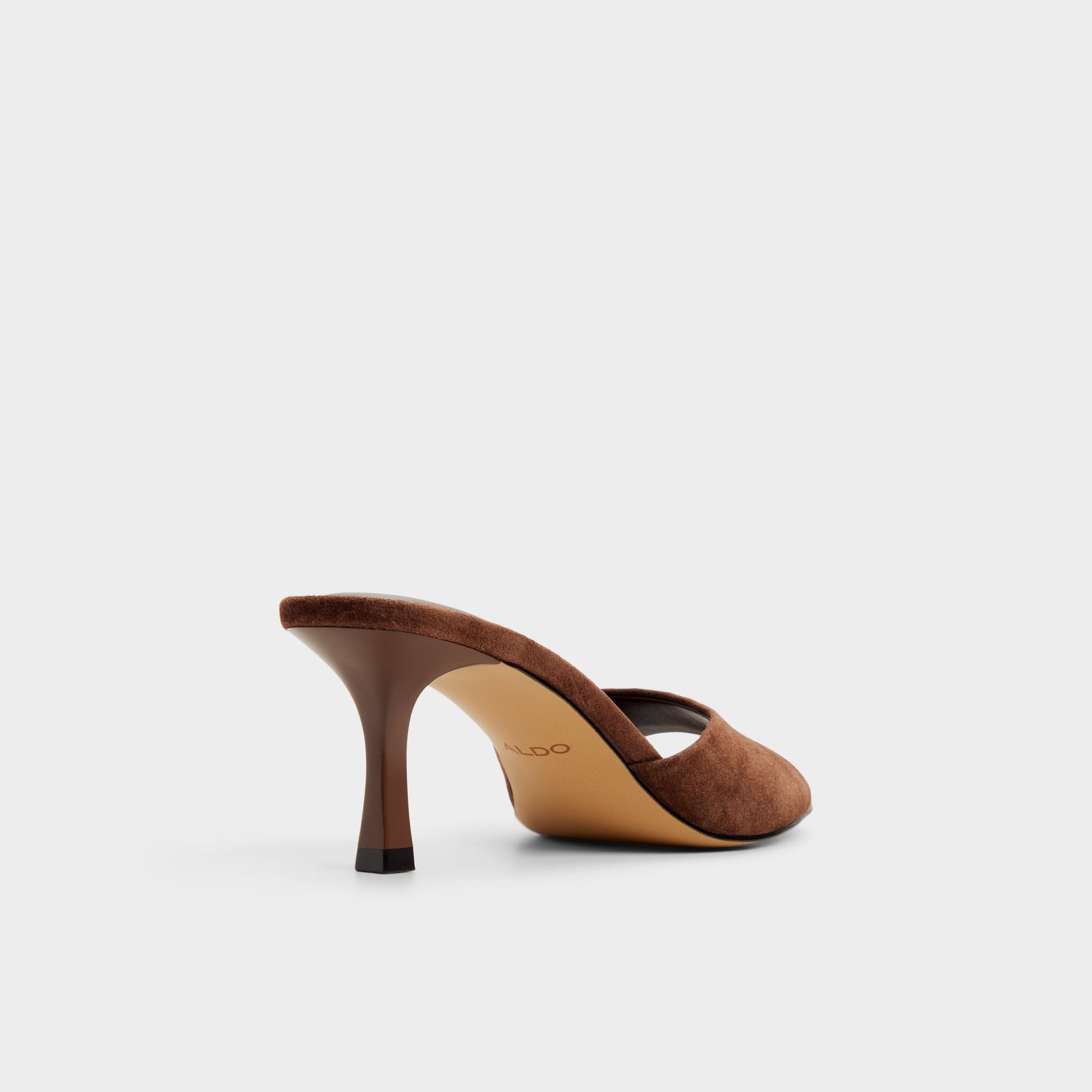 Three-quarter angle of Dark brown Annaberaen Heeled mule's back side