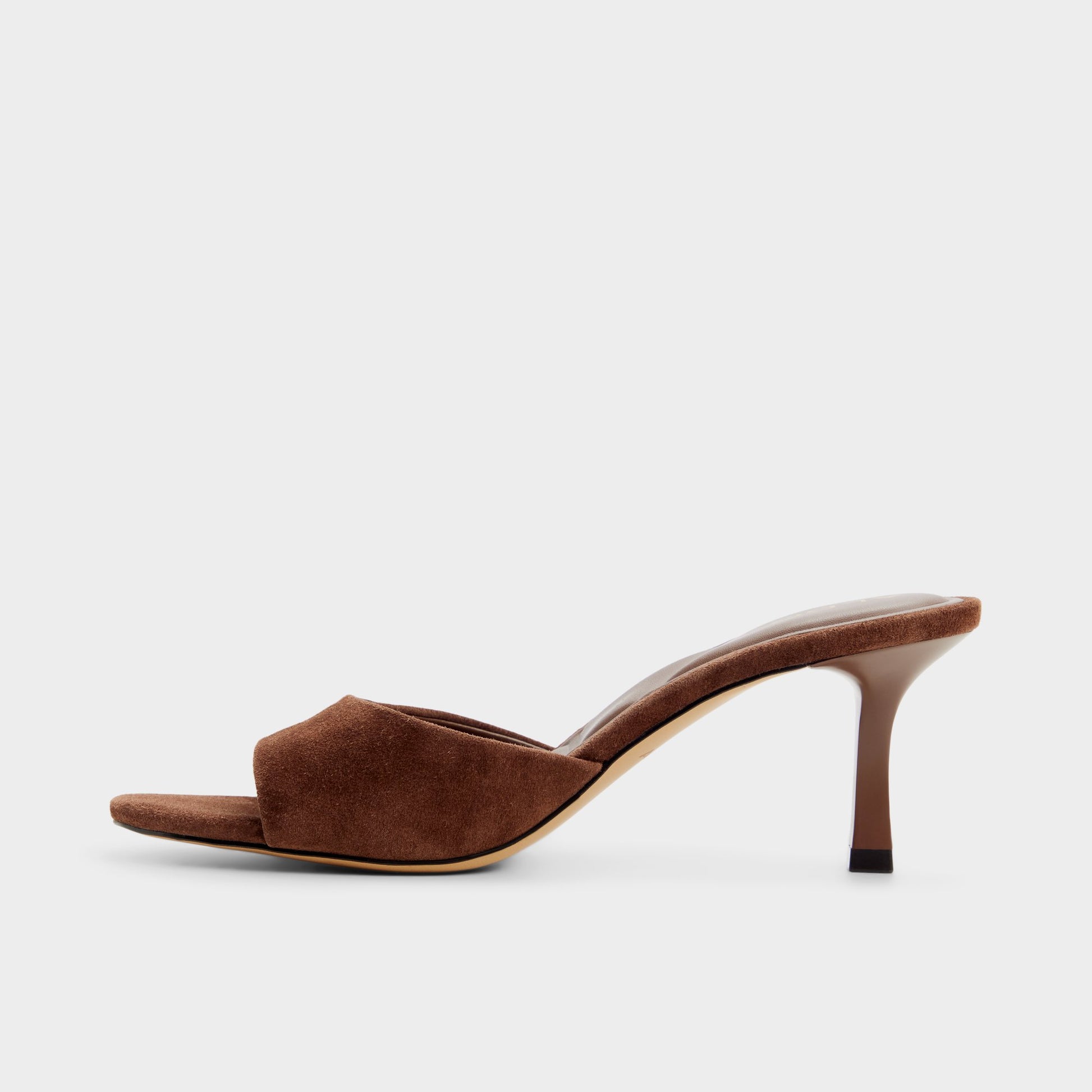 Side view of Dark brown Annaberaen Heeled mule
