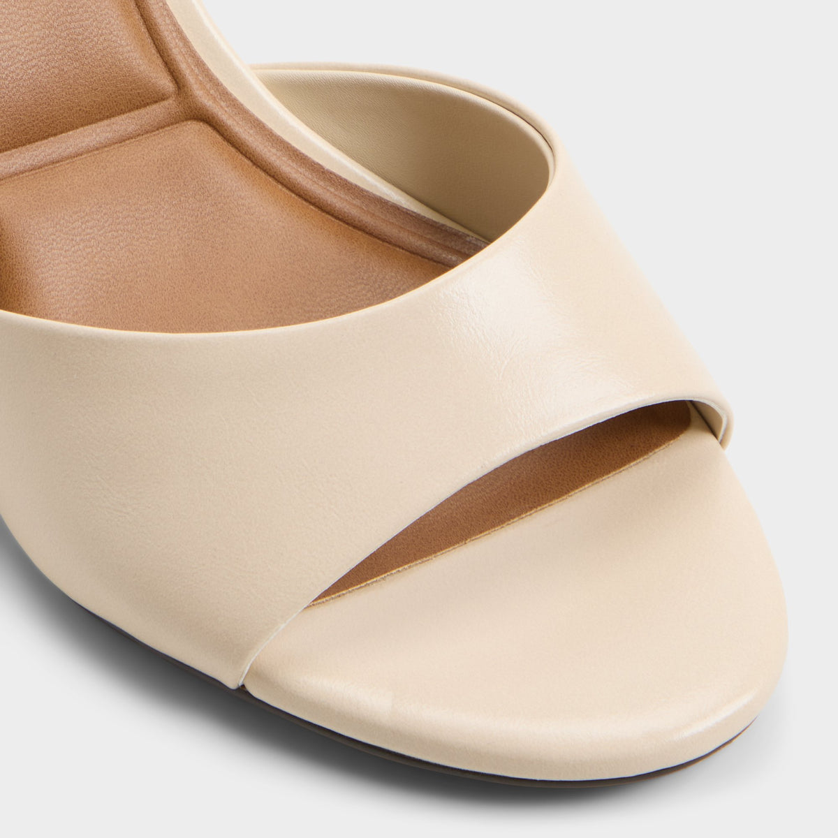 Close-up of the Cream Annaberaen Heeled mule