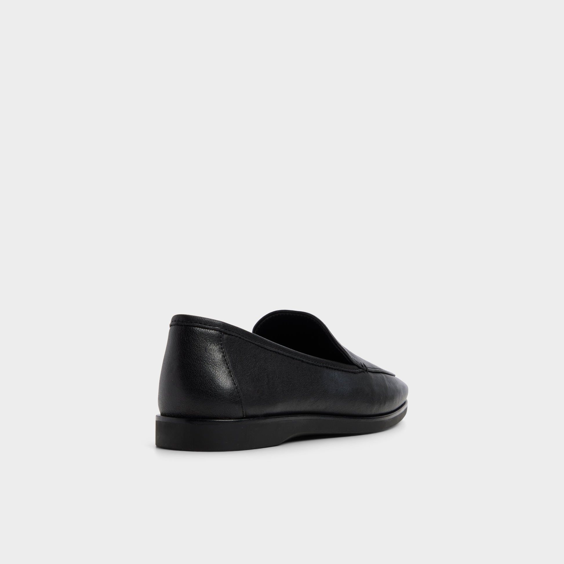 Three-quarter angle of Black Annnie Loafer's back side