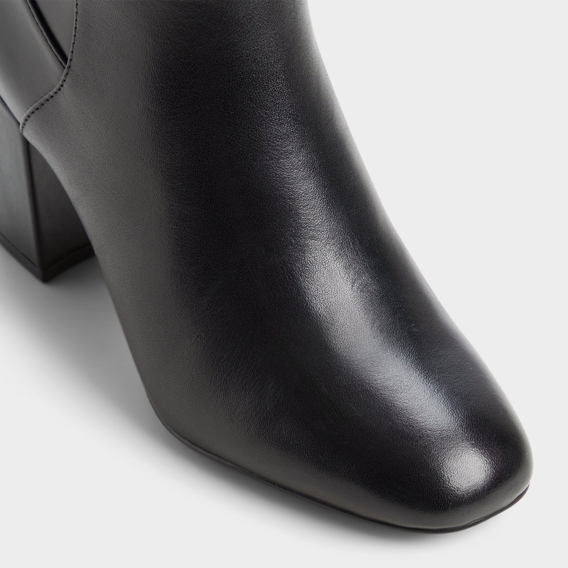 Three-quarter angle of Black/black Satori-xwc Block heel knee-high boot's front side