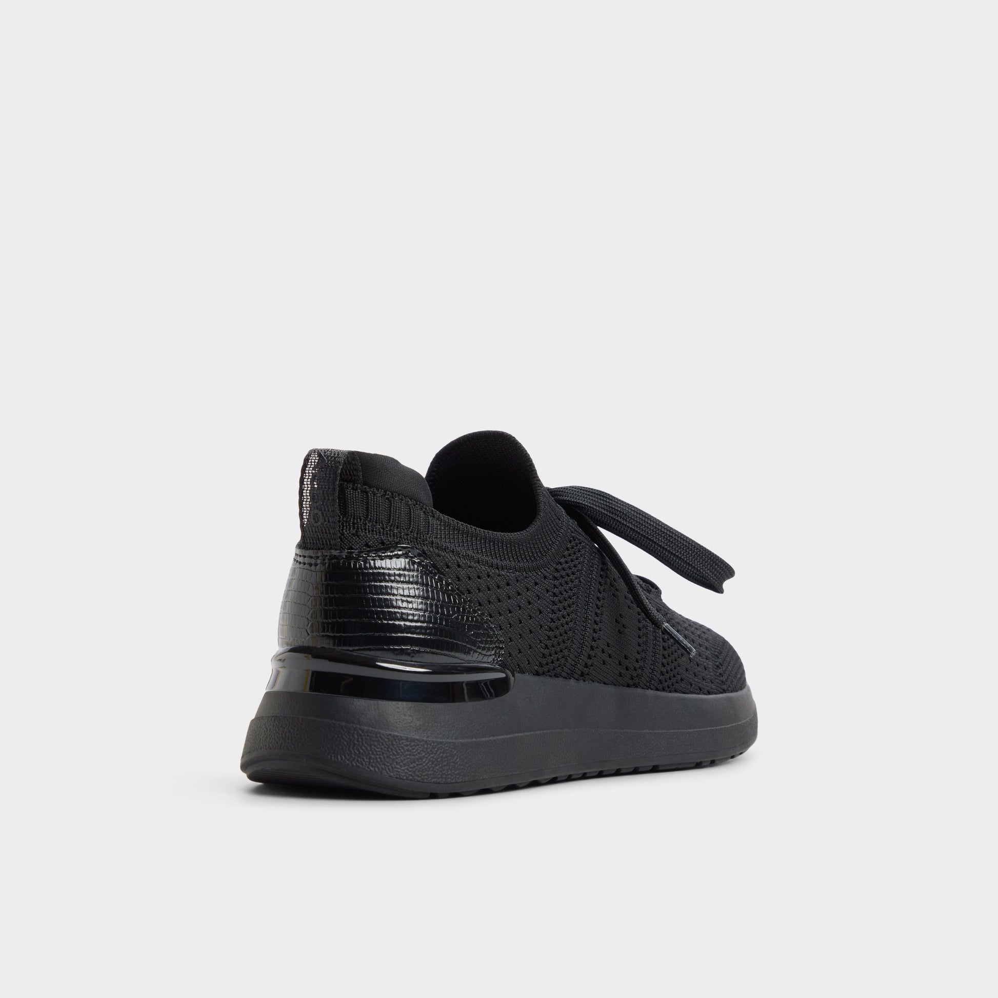 Three-quarter angle of Black Korra Sneaker's back side