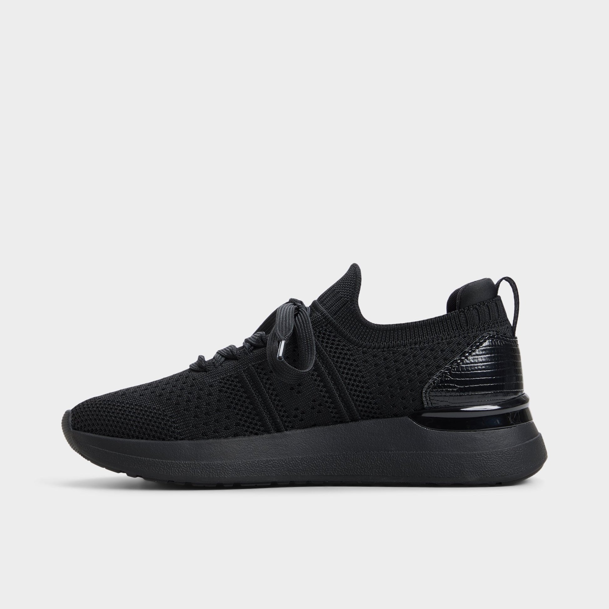 Side view of Black Korra Sneaker