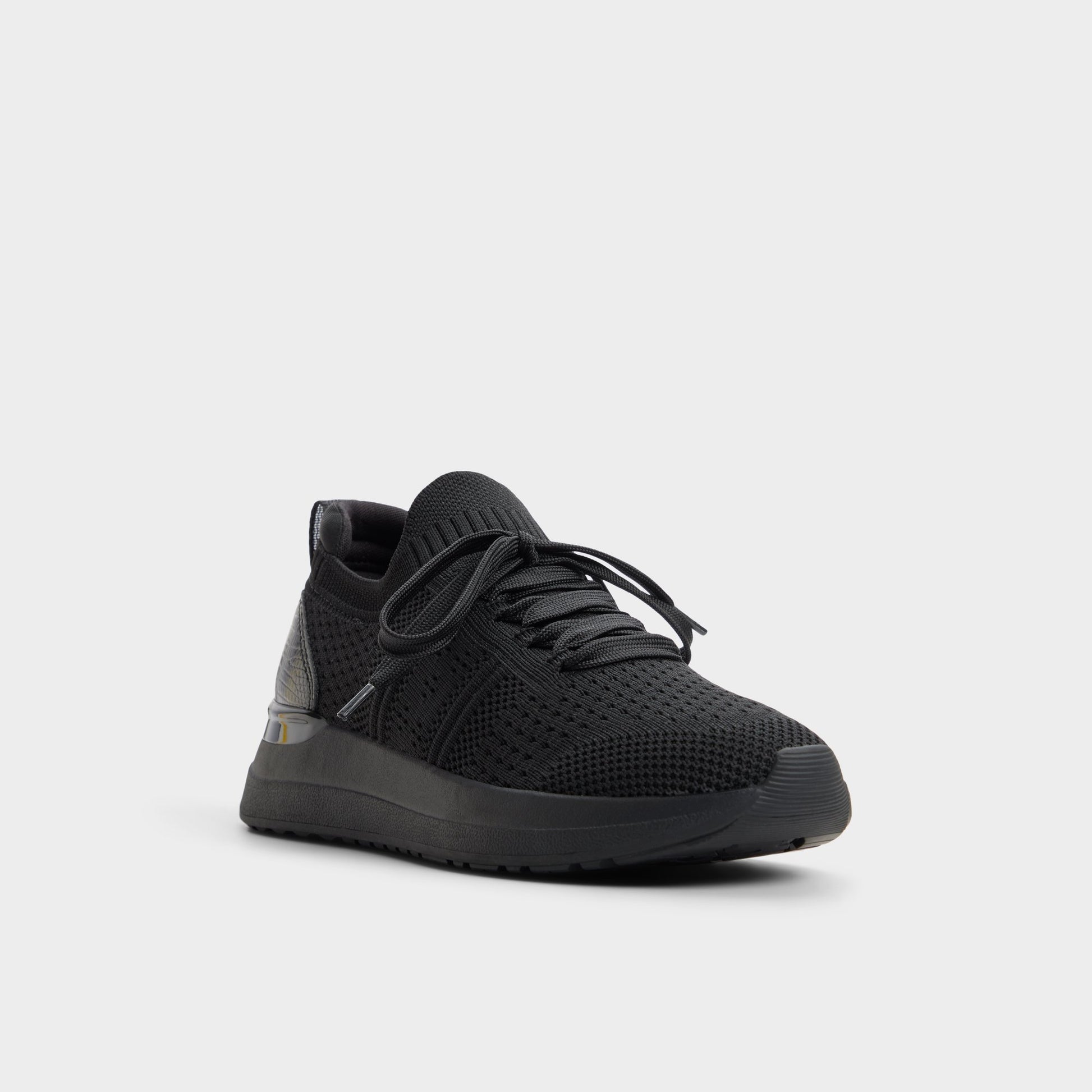 Three-quarter angle of Black Korra Sneaker's front side