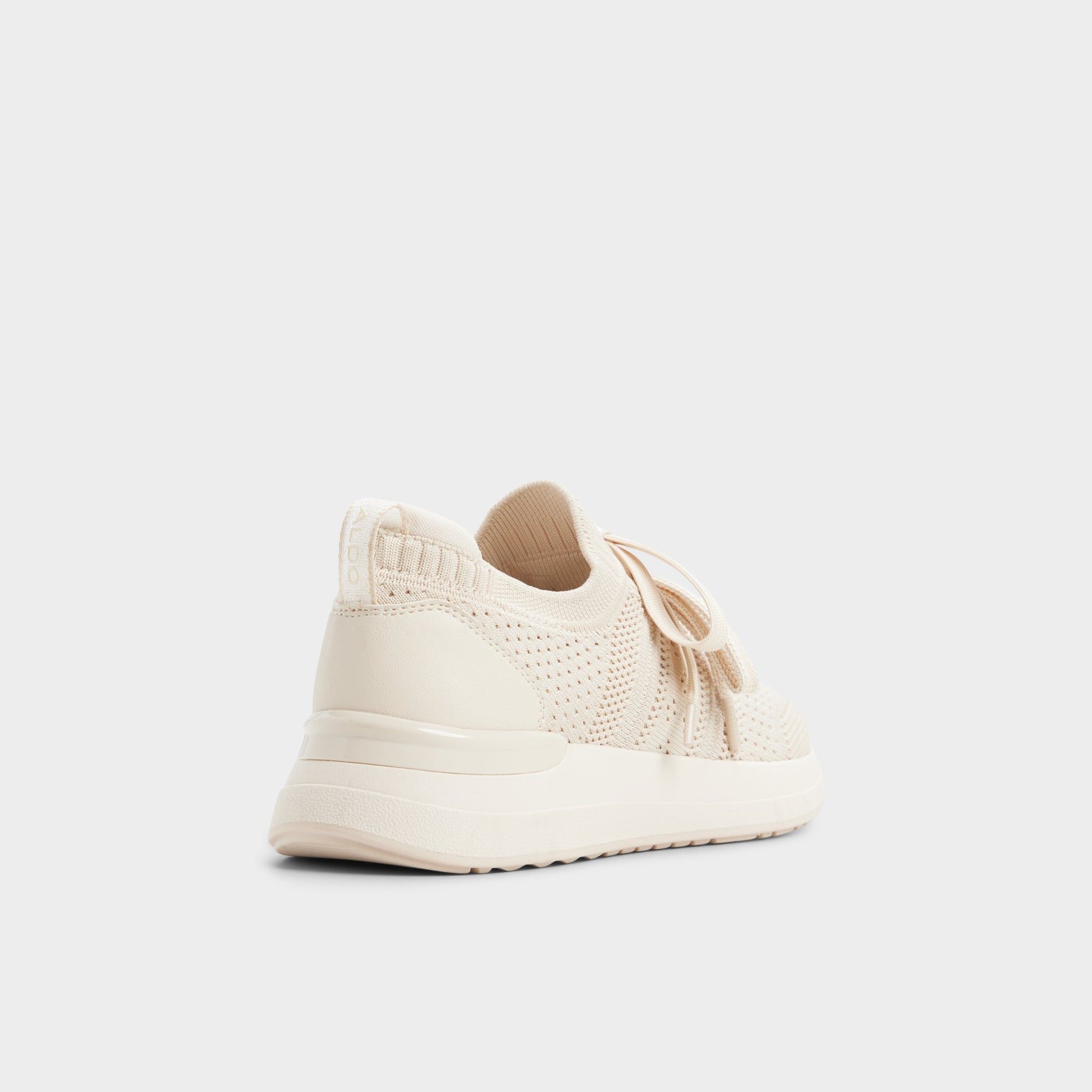 Three-quarter angle of Other white Korra Sneaker's back side