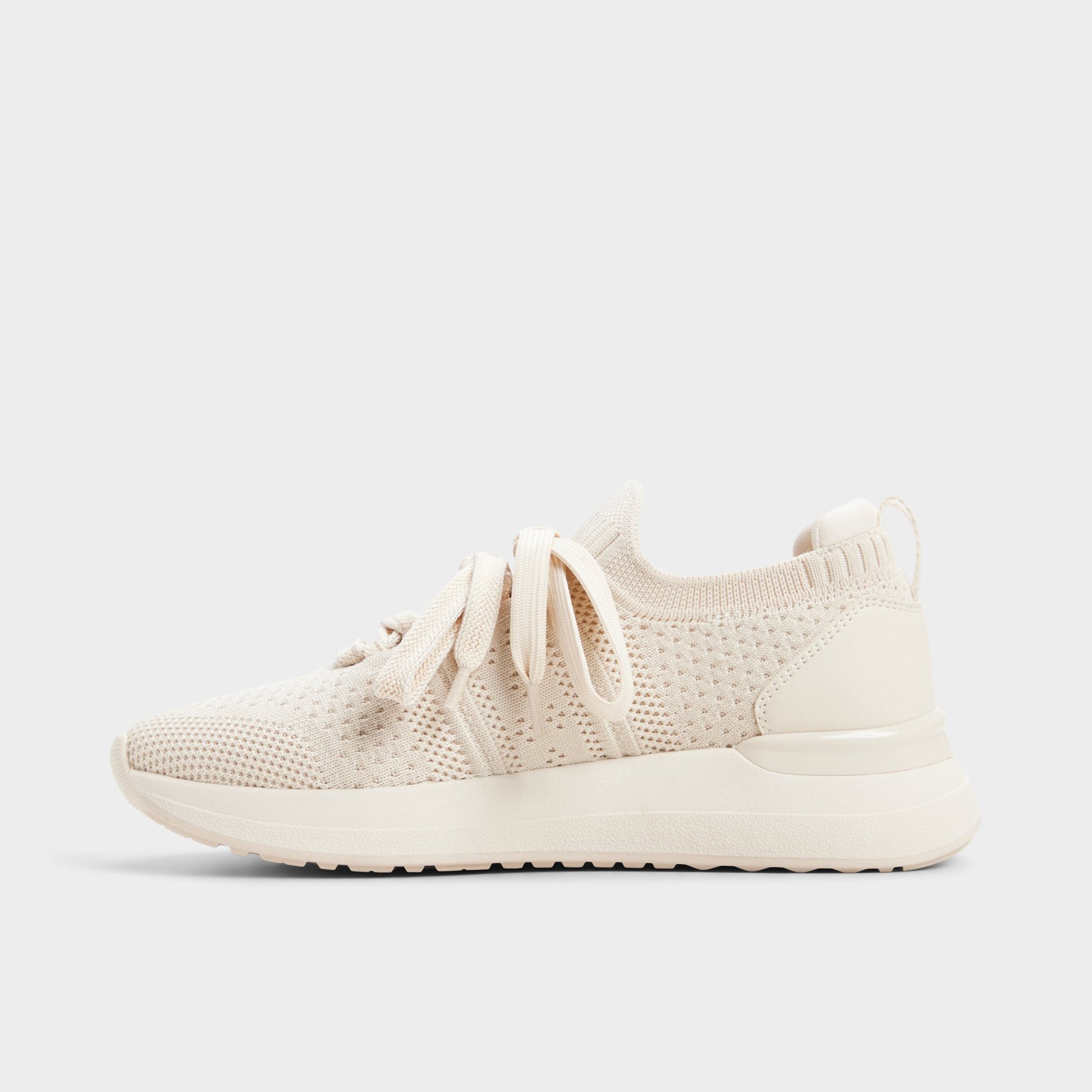 Side view of Other white Korra Sneaker