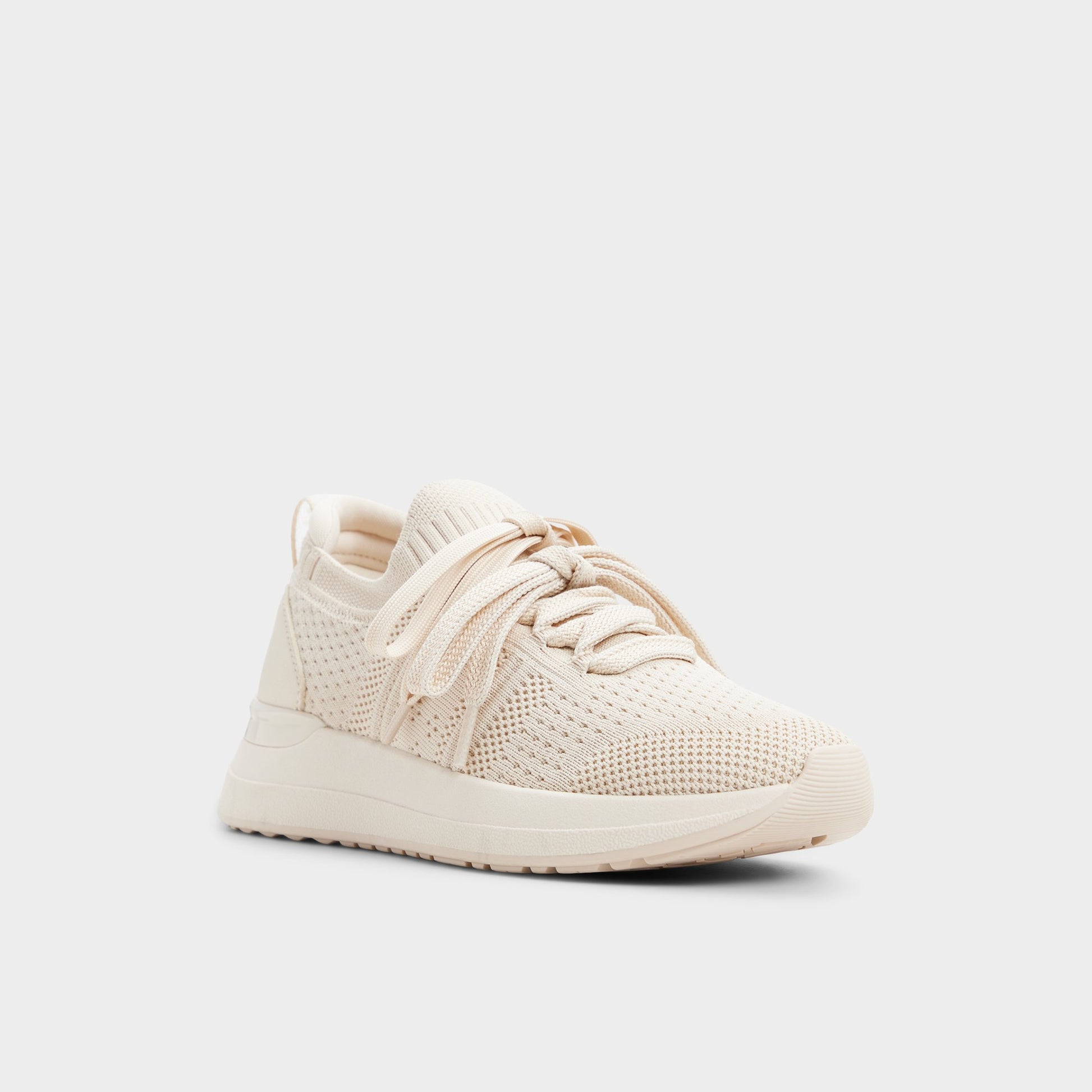 Three-quarter angle of Other white Korra Sneaker's front side