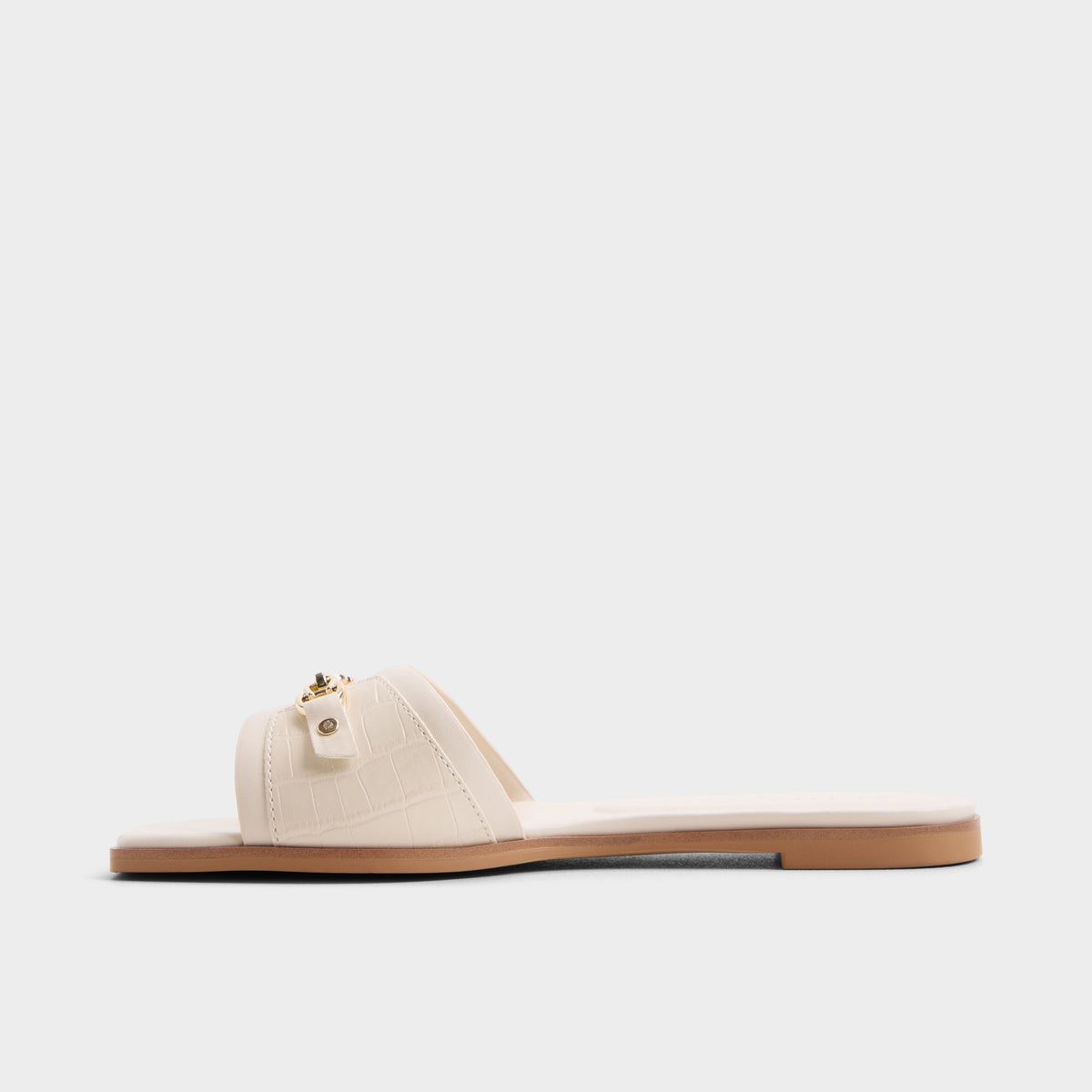 Side view of White/bone Alo Slide sandal
