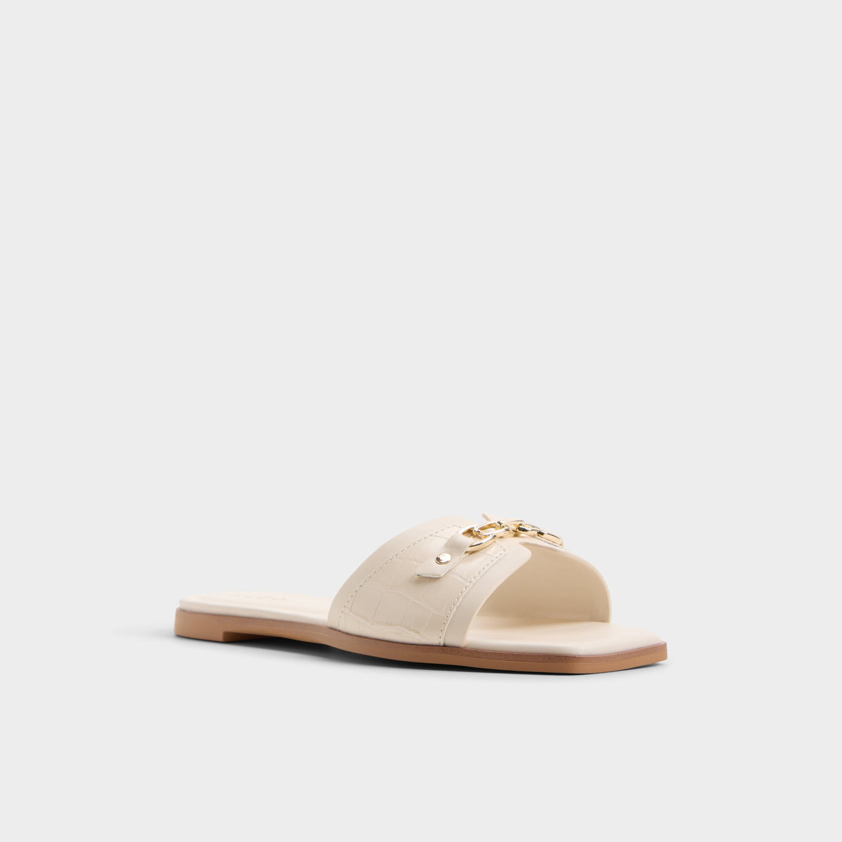 Three-quarter angle of White/bone Alo Slide sandal's front side
