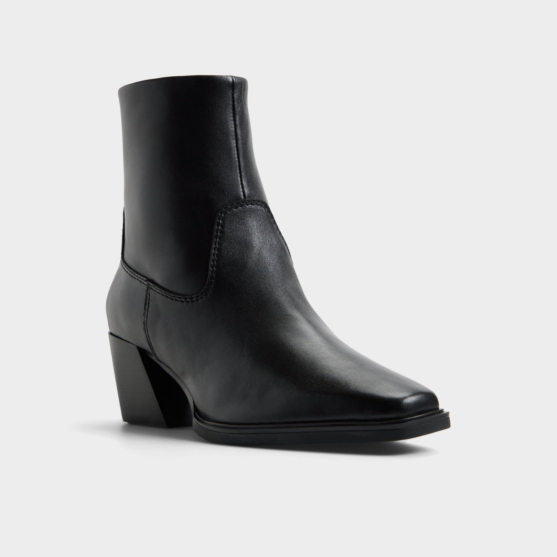 Three-quarter angle of Black Ybiraweth Block heel ankle boot's front side