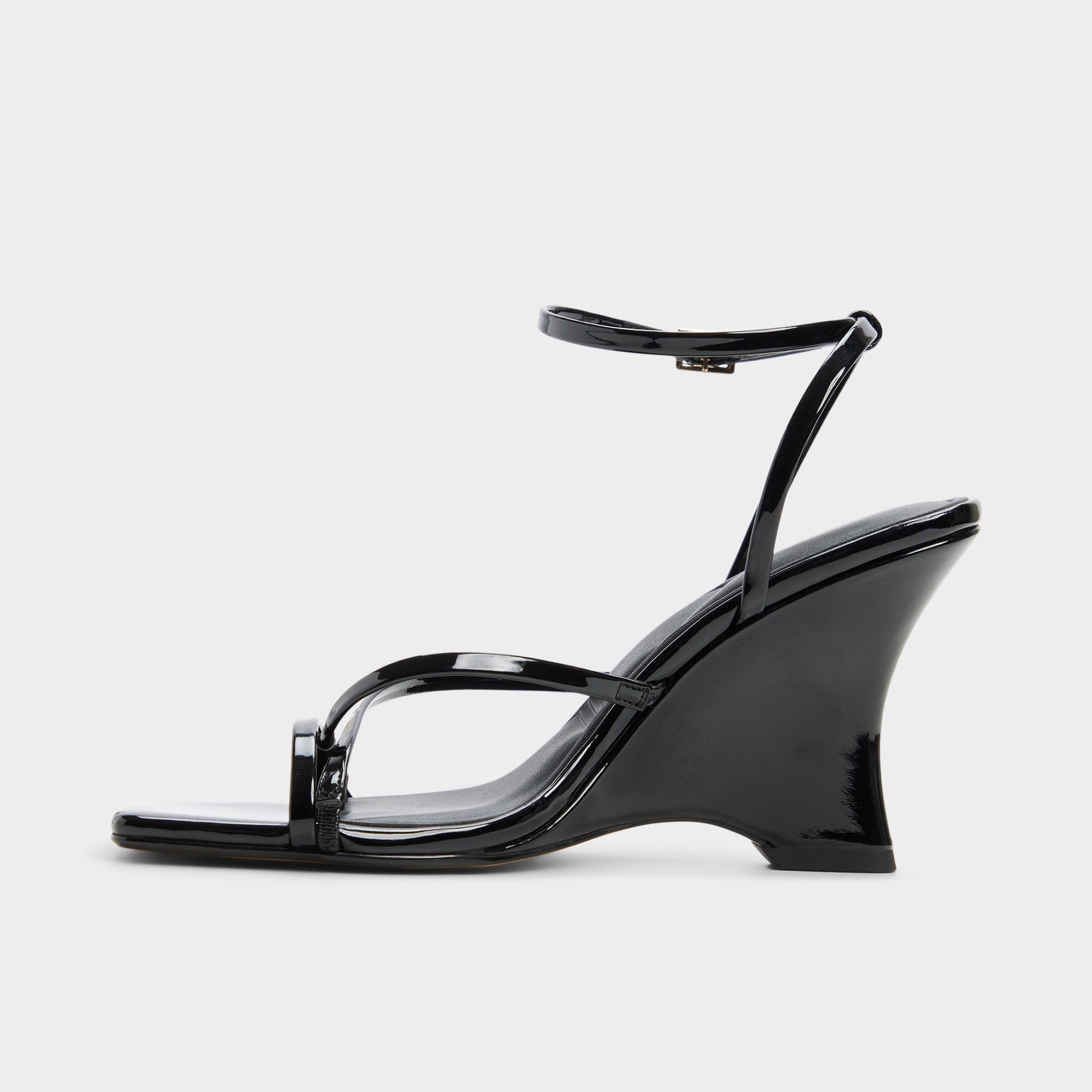 Side view of Black Lexina Strappy heeled sandal