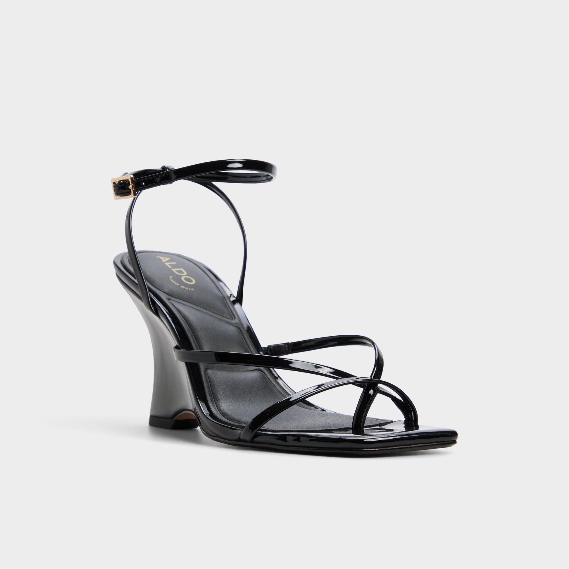 Three-quarter angle of Black Lexina Strappy heeled sandal's front side