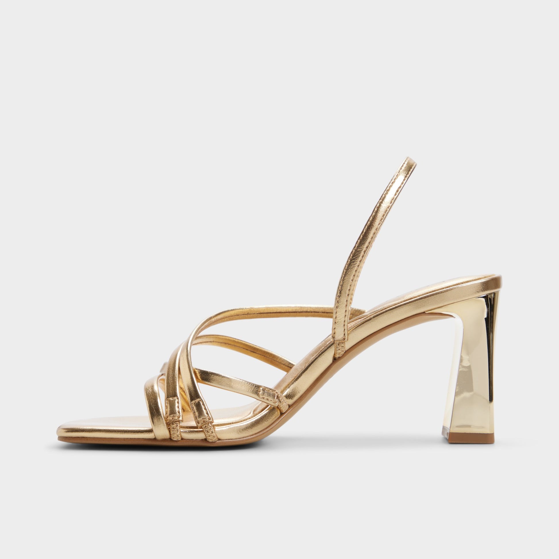 Side view of Gold Sonali Strappy heeled sandal