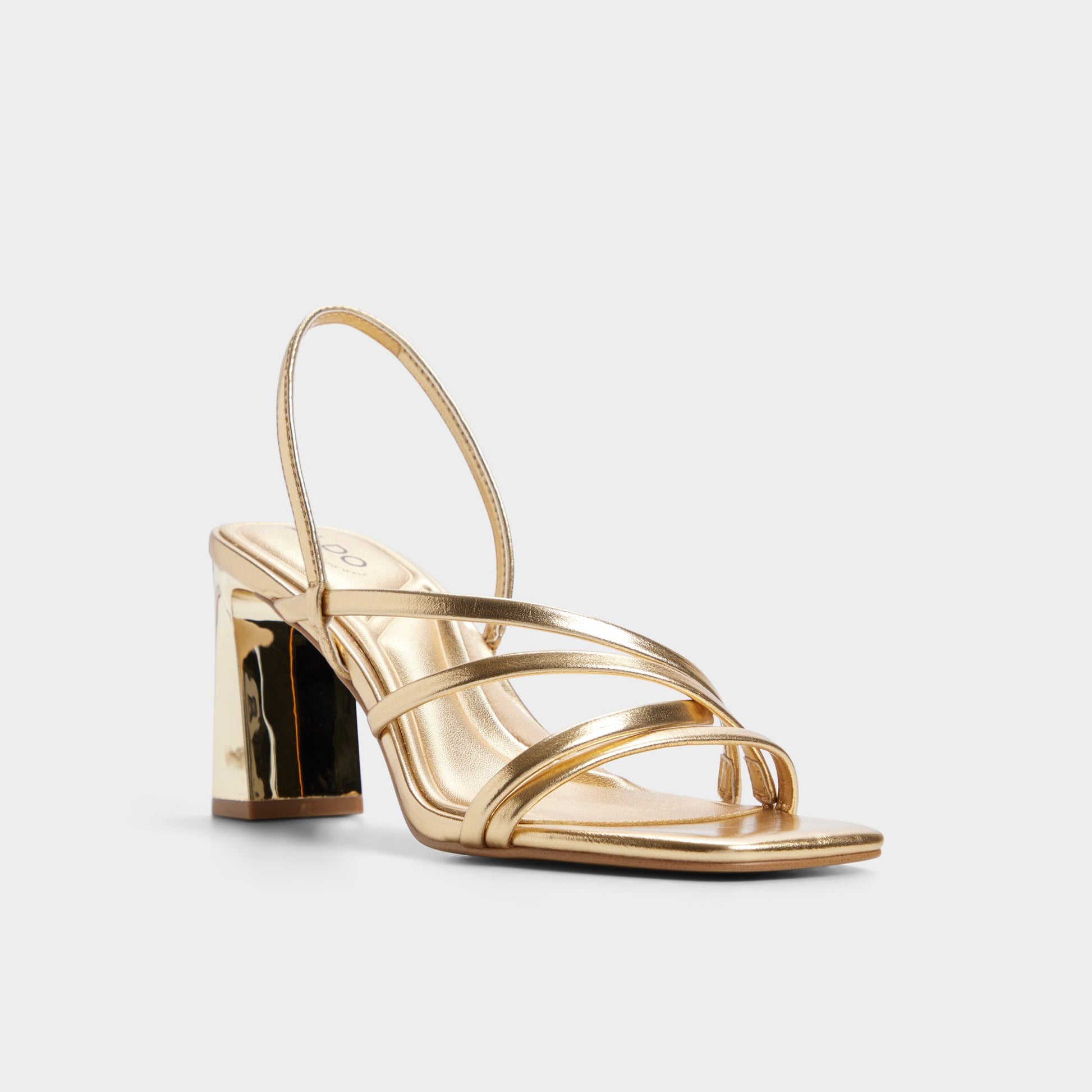 Three-quarter angle of Gold Sonali Strappy heeled sandal's front side