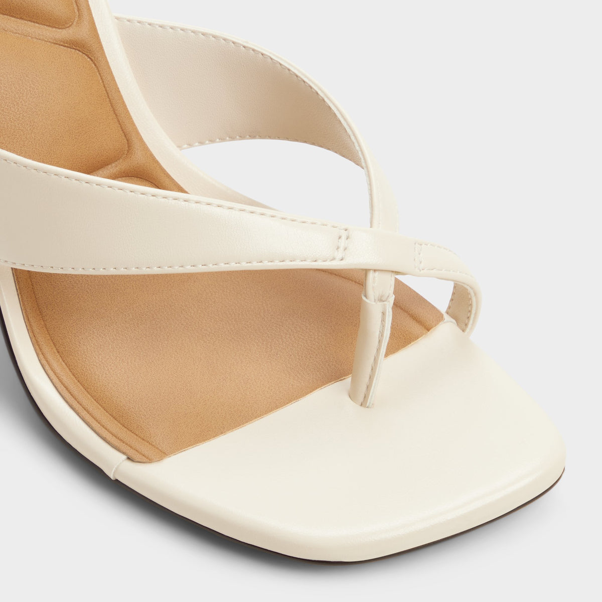 Close-up of the Other white Haayssie Heeled flip flop